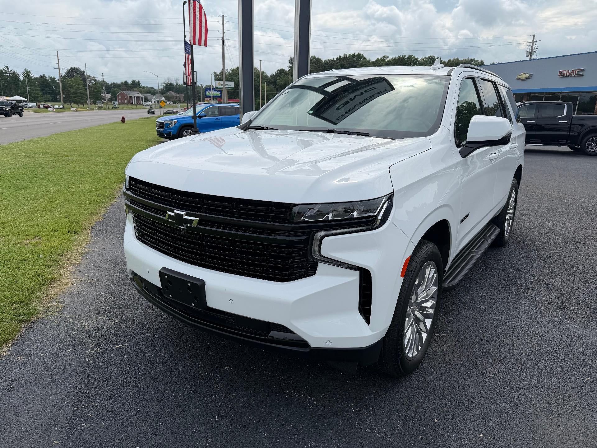 2023 Chevrolet Tahoe RST in Summit White — front three-quarter view