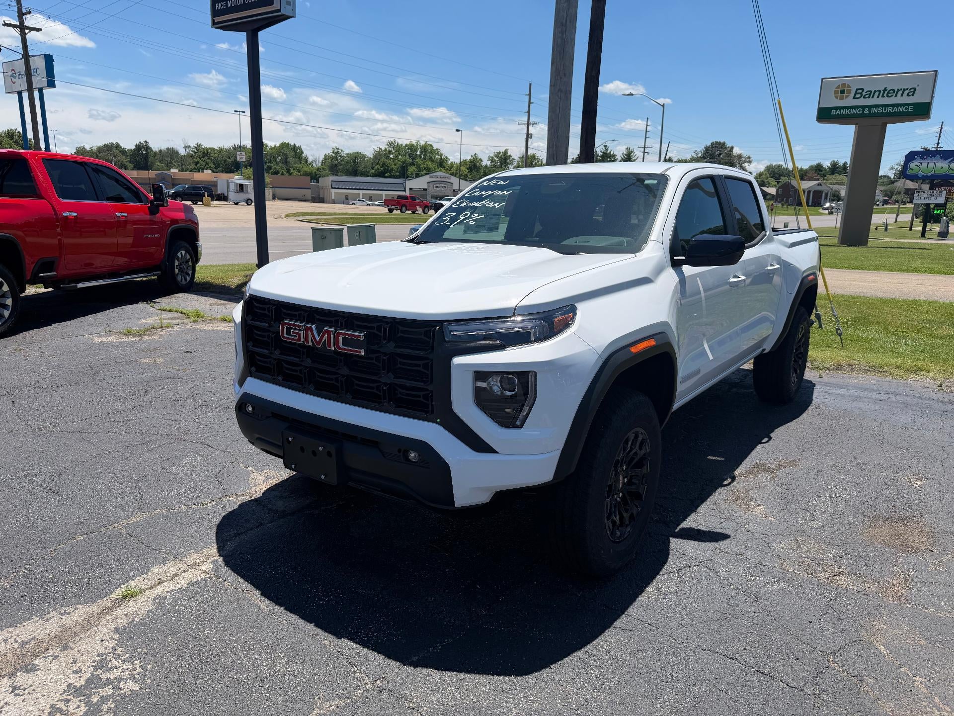 2026 GMC Canyon Elevation in Summit White — front three-quarter view