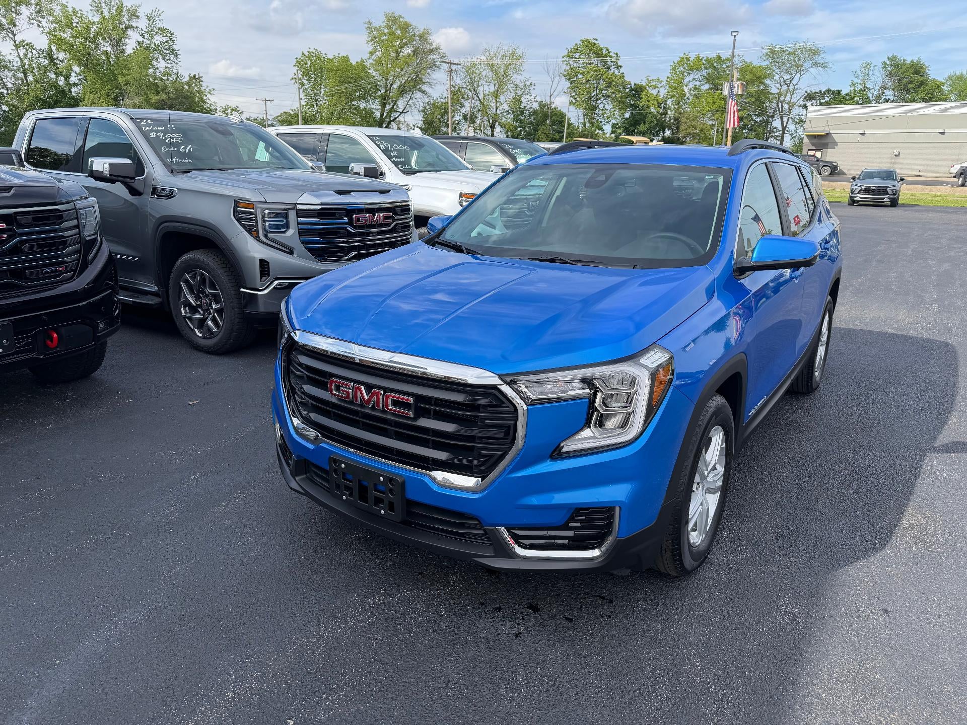 2024 GMC Terrain SLE in Riptide Metallic — front three-quarter view