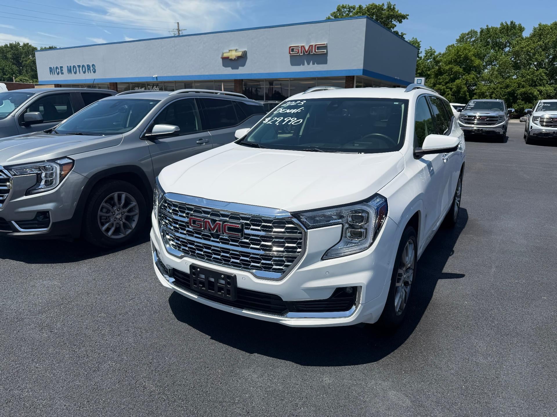 2023 GMC Terrain Denali in Summit White — front three-quarter view